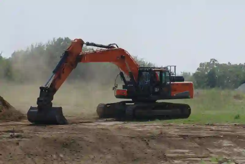 excavator working at a construction site images