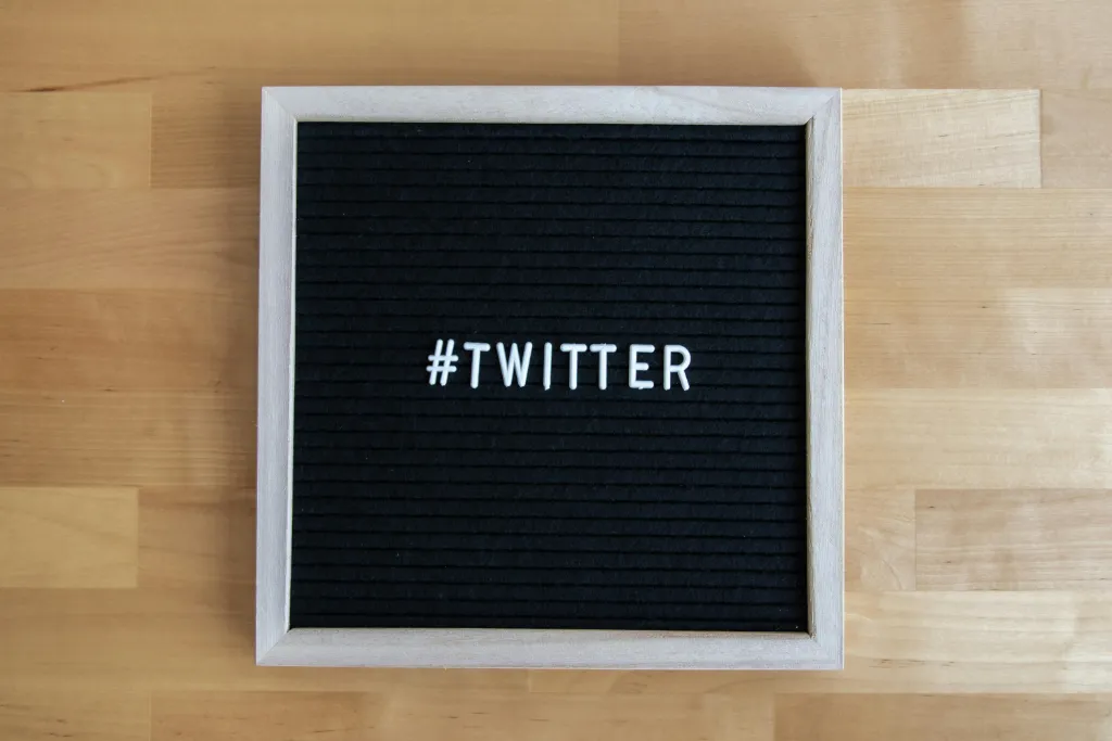Twitter hashtag on a felt letter board