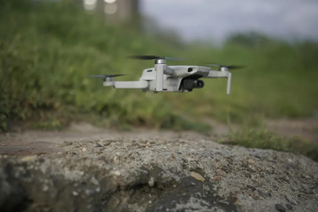 Grey drone in flight